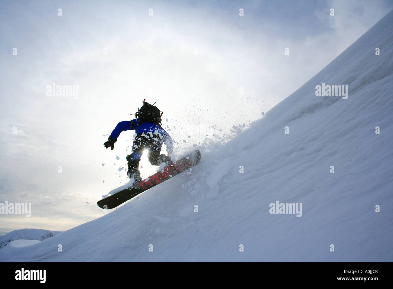 Snowboarder in Aktion Stockfoto