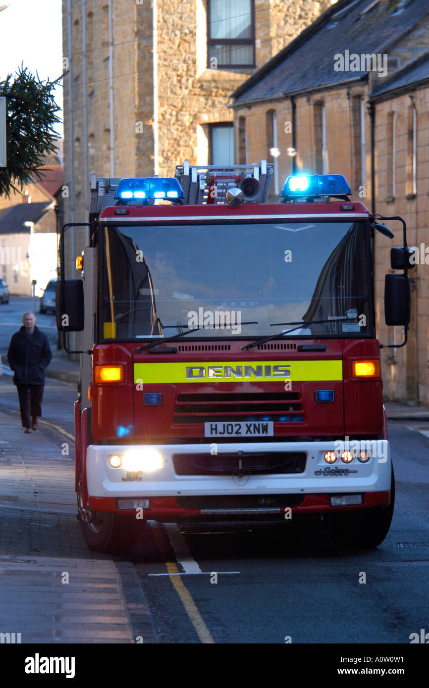 Ein britischer Feuerwehrauto auf eine Legende zu einem Brand. Stockfoto