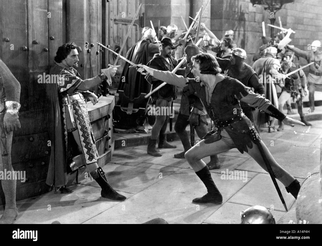 Die Abenteuer von Robin Hood Jahr 1938 Regisseure Michael Curtiz und William Keighley Errol Flynn Basil Rathbone Stockfoto