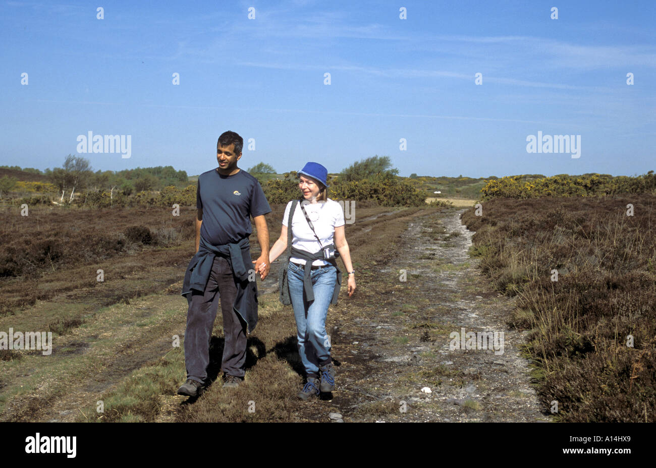 Wanderer auf Hartland festmachen nationale Naturreservat in Dorset Stockfoto