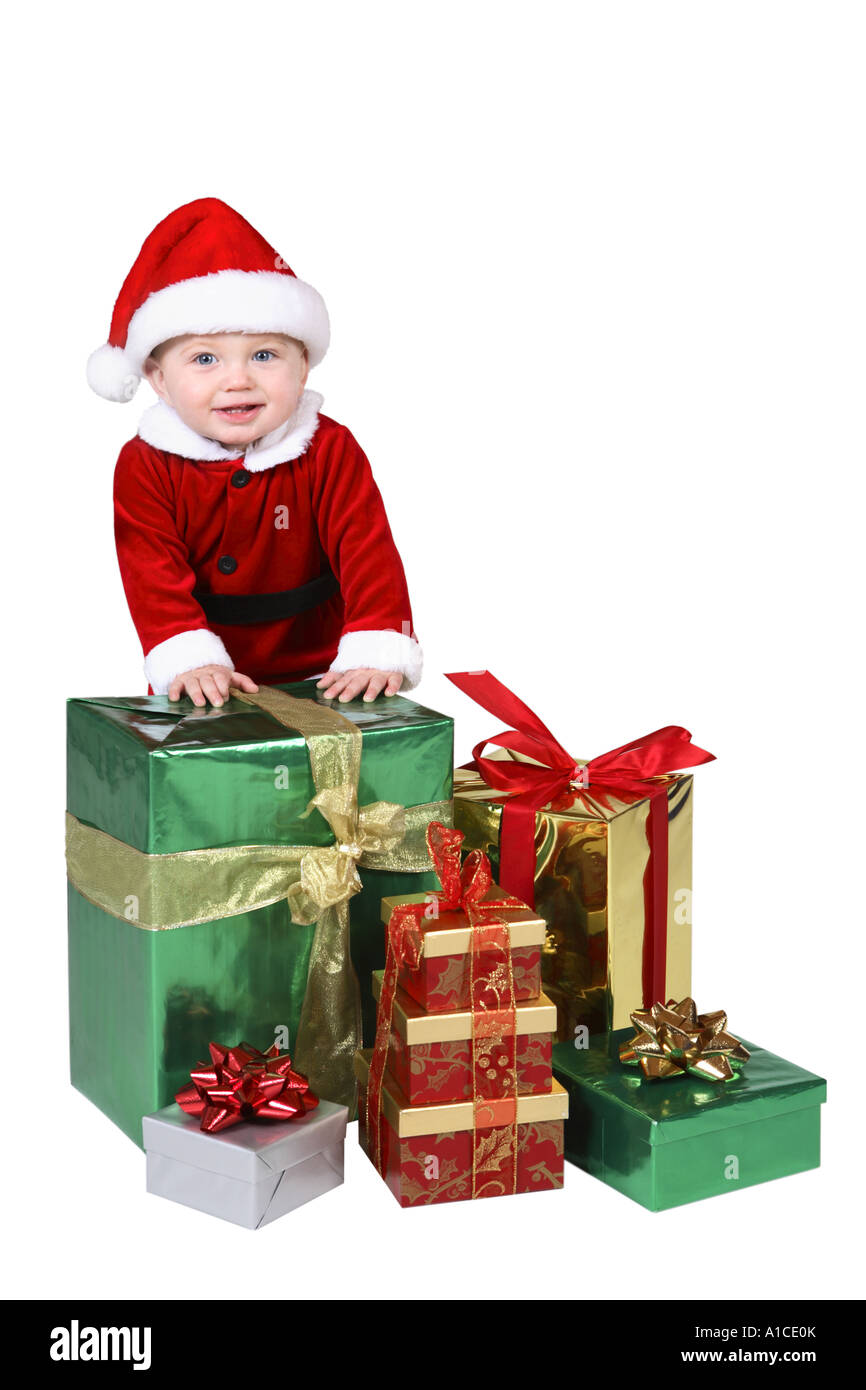 Baby im Weihnachtsmannkostüm mit Geschenken Stockfoto