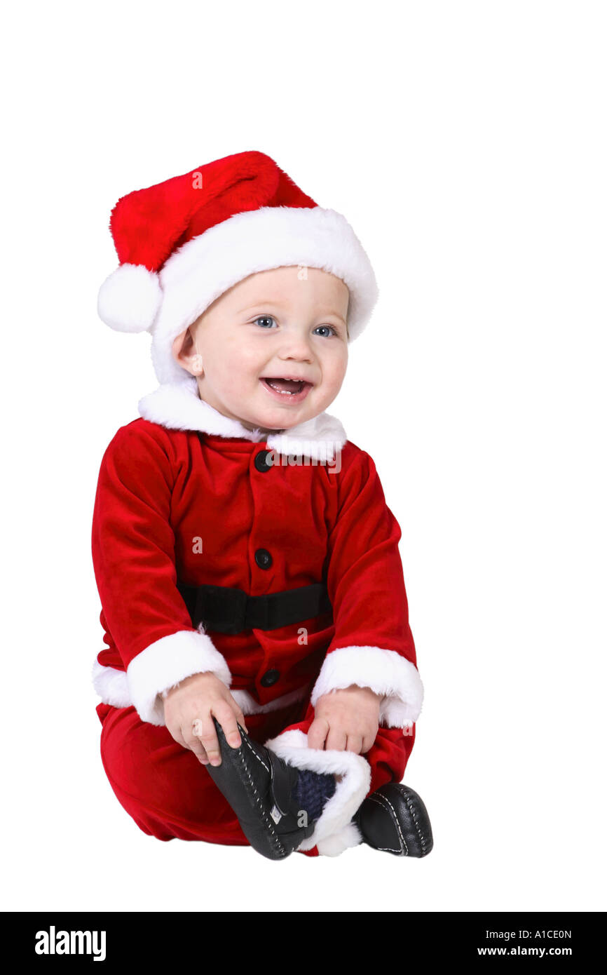 Baby im Weihnachtsmannkostüm Stockfoto