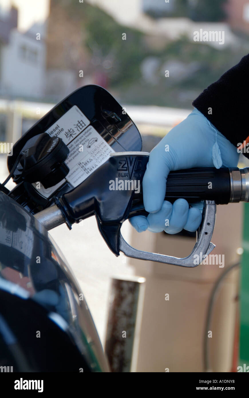 Benzin, Pumpe, Diesel, Auto, tanken, Füllung, Bahnhof, Handschuh, Schutz-, Kautschuk, Handschuhe, Fossil, Kraftstoff, Kohlenstoff, Kohlendioxid, ver- Stockfoto