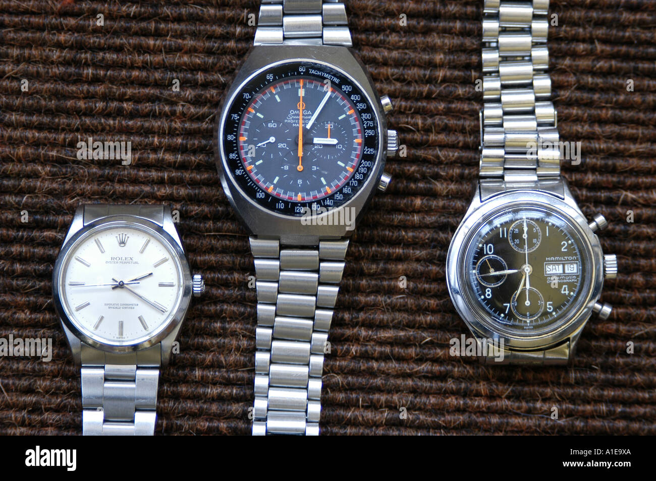 Drei Armbanduhren in Folge Stockfoto