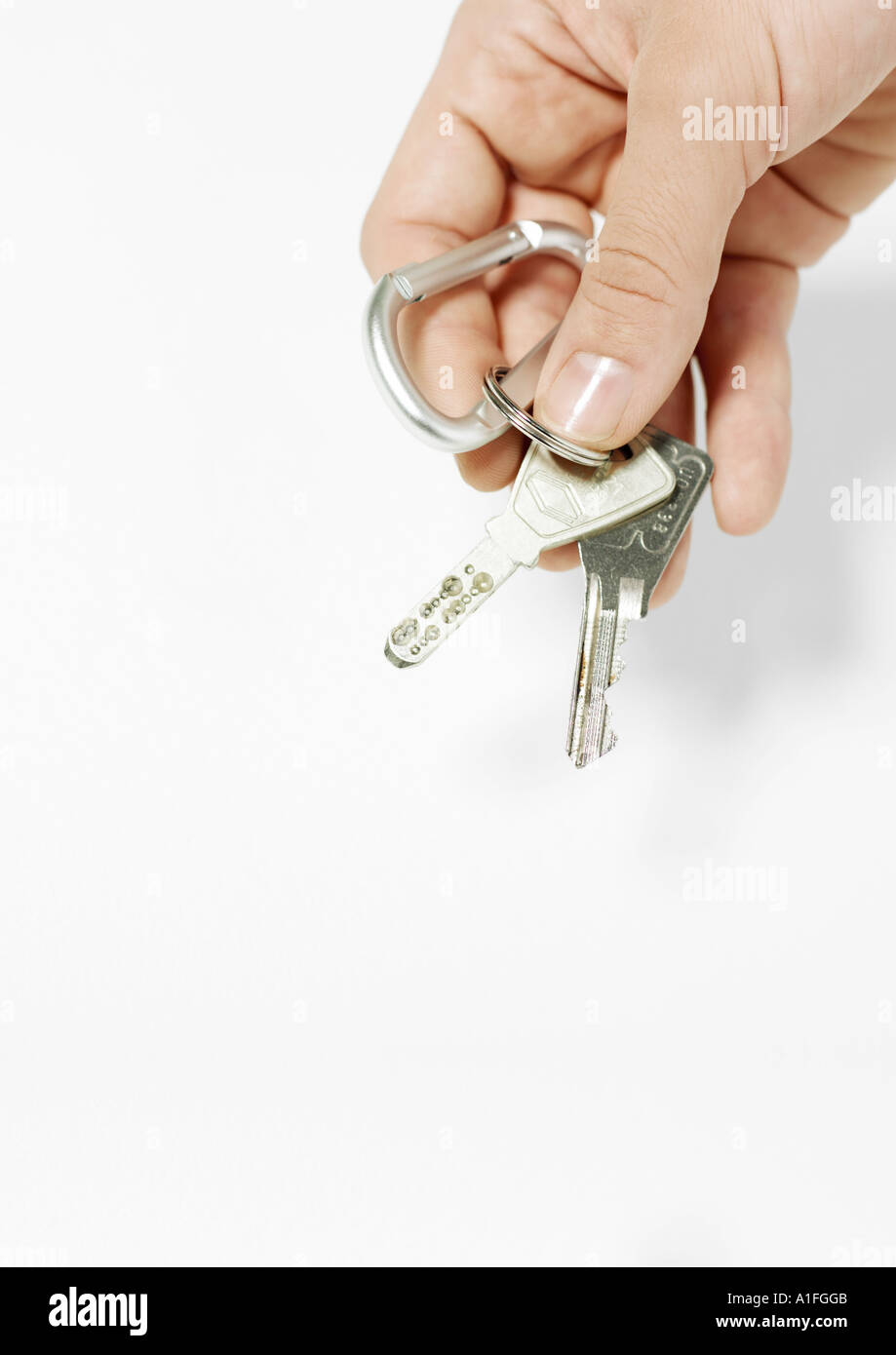 Hand halten Schlüssel Stockfoto