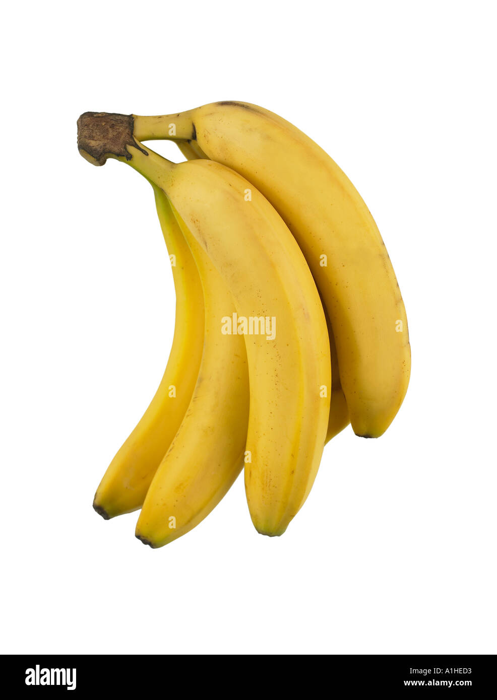 REIHE VON REIFE GELBE BANANEN AUF WEIßEM HINTERGRUND Stockfoto