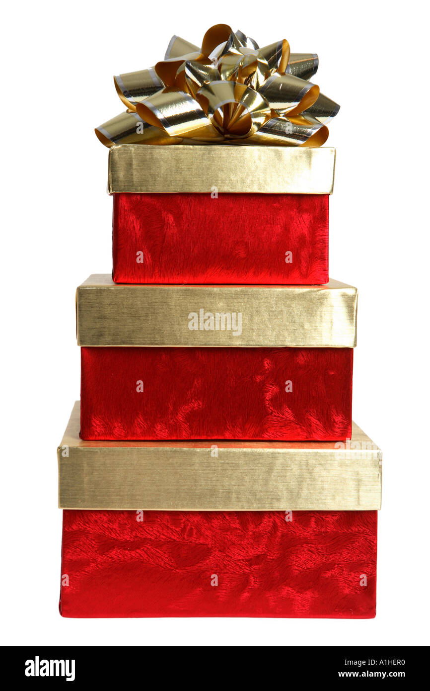 Stapel von Weihnachten präsentiert mit gold Bogen an der Spitze Stockfoto