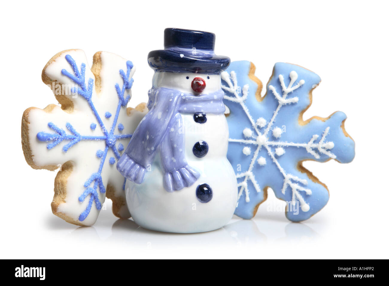 Schneeflocke-Cookies und Schneemann Stockfoto