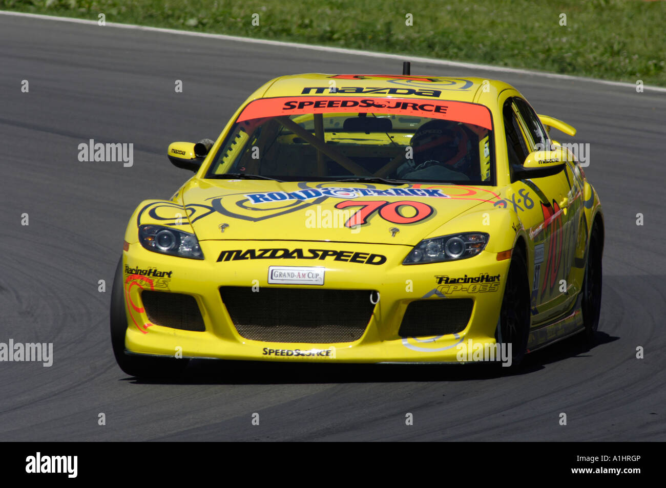 Der Speedsource Mazda RX-8 raste durch David Haskell und Sylvain Tremblay in der Mid-Ohio Sports Car Course 2006 Stockfoto