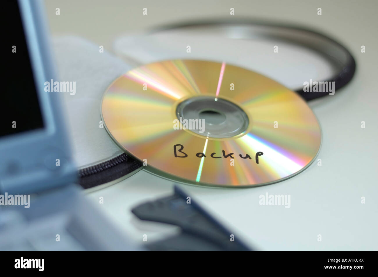 CD mit der Bezeichnung Backup Stockfoto