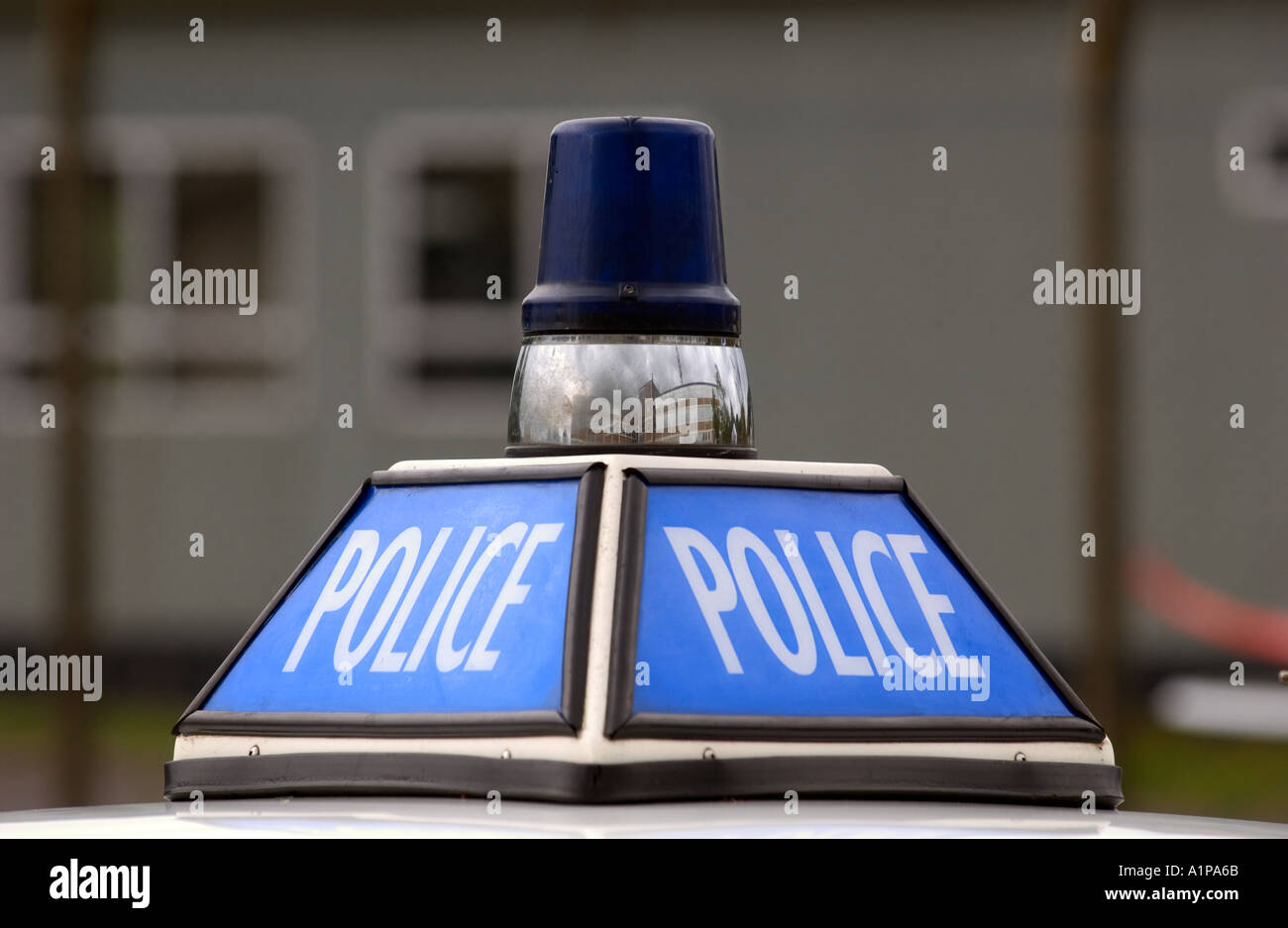 Eine altmodische Zeichen auf ein Polizeiauto Stockfoto