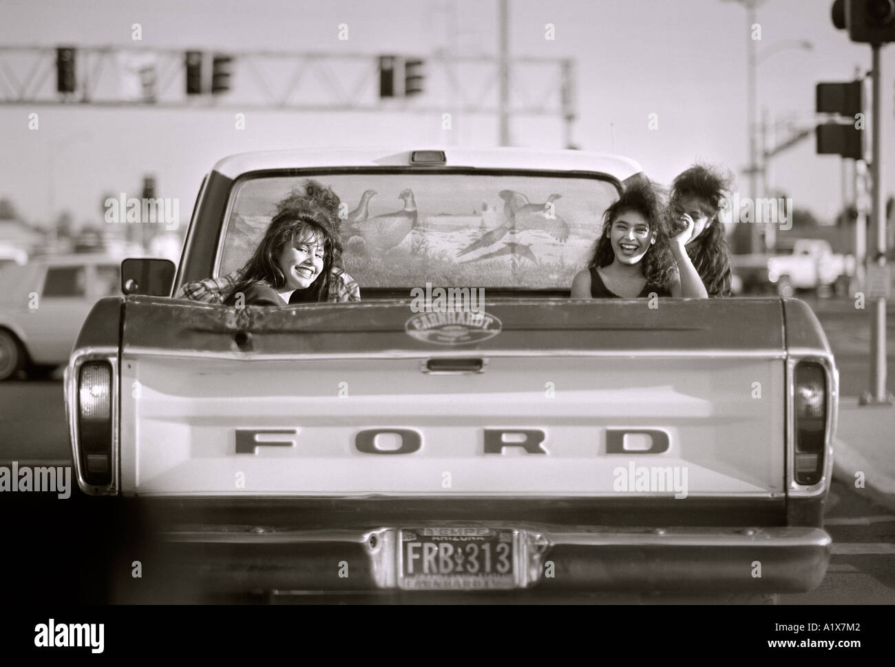Ford Pick-up-Truck mit 3 Mädchen in den Rücken, Phoenix Arizona, Vereinigte Staaten von Amerika. Stockfoto