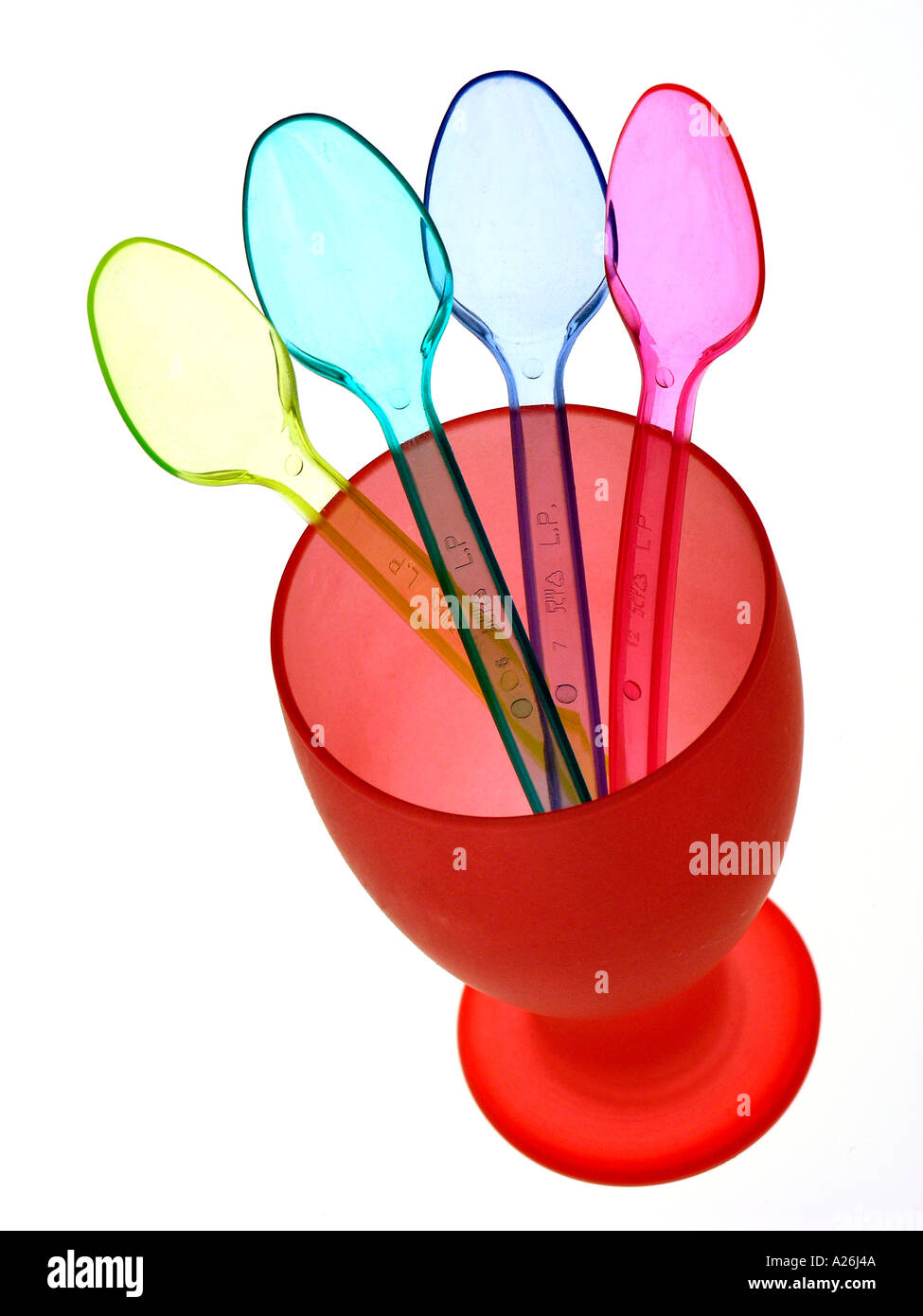 Plastik Löffel und Tasse Stockfoto