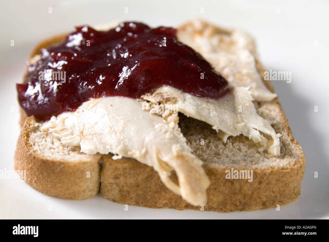 Übrig gebliebene Türkei Sandwich mit Preiselbeersoße Stockfoto