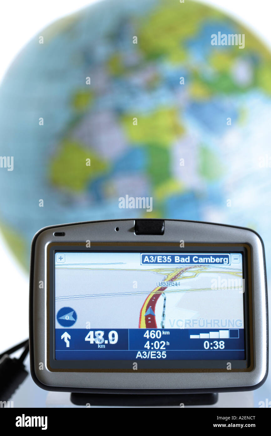 Navigationsinstrument vor Globus, Nahaufnahme Stockfoto