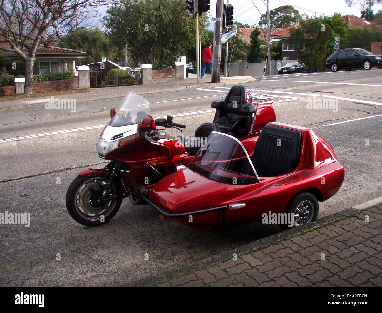 Eine rote Luxus Honda Motorrad und angehängte Beiwagen Stockfoto