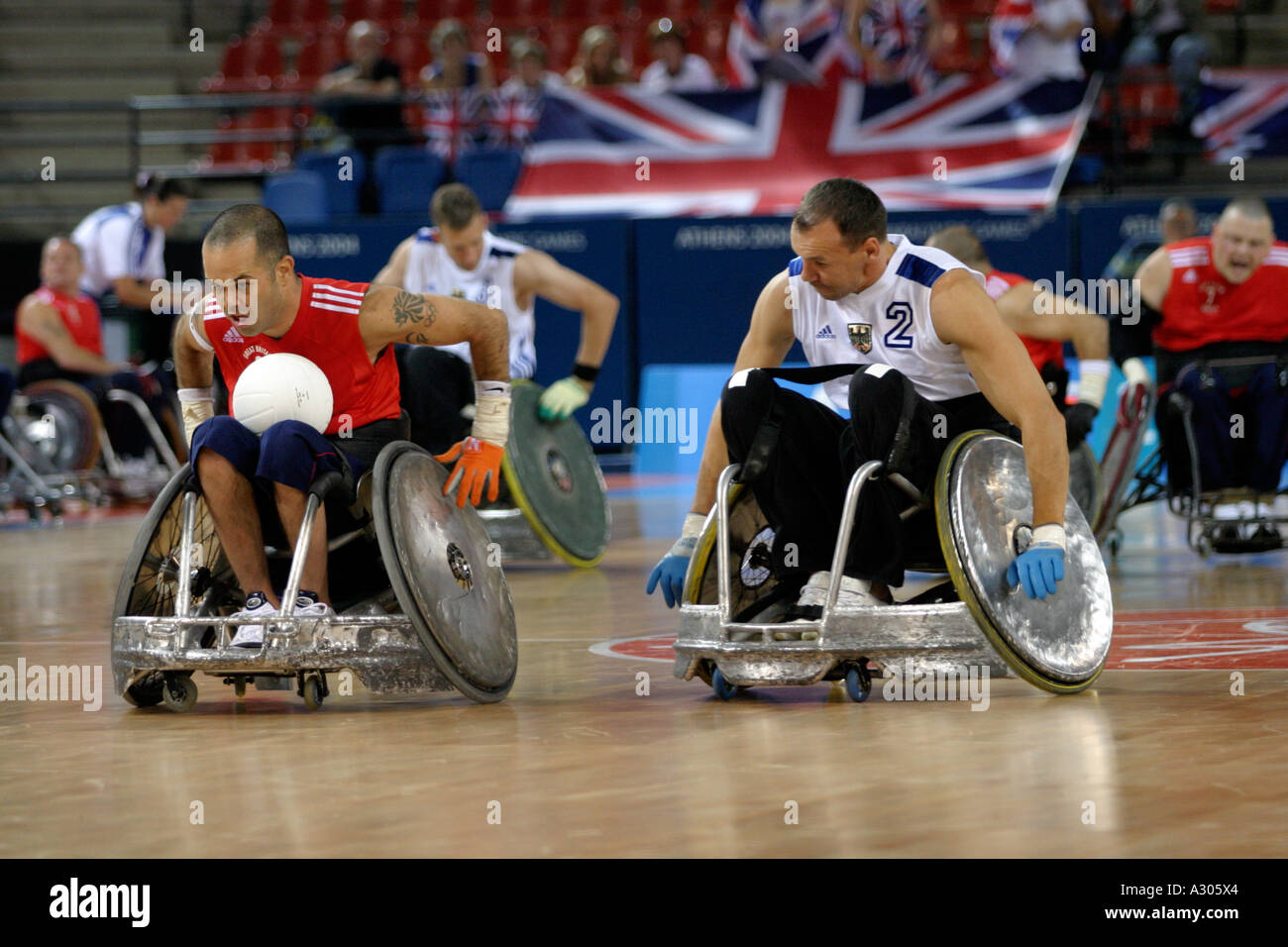 Troye Collins GbR in Aktion in der Rollstuhl-Rugby-Öffnung Runde Spiel zwischen GBR und GER at the Athens 2004 Paralympischen Spielen Stockfoto