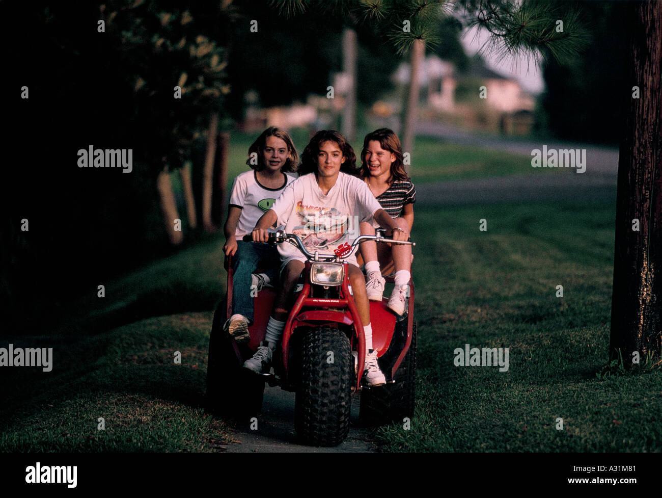 amerikanische Kinder reiten quadbike Stockfoto