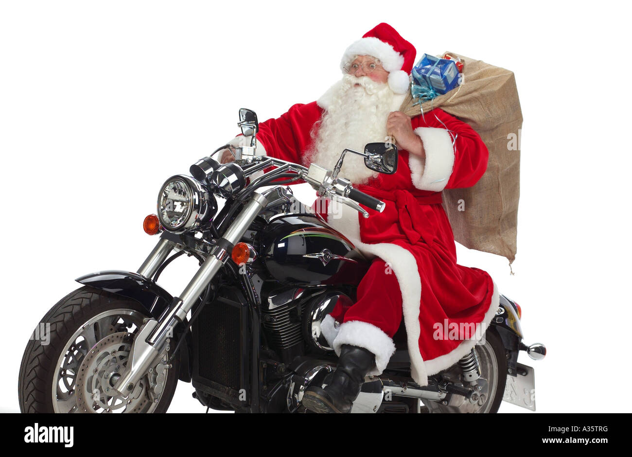 Nikolaus Auf Einem Motorrad, Weihnachtsmann auf Motorrad Stockfoto