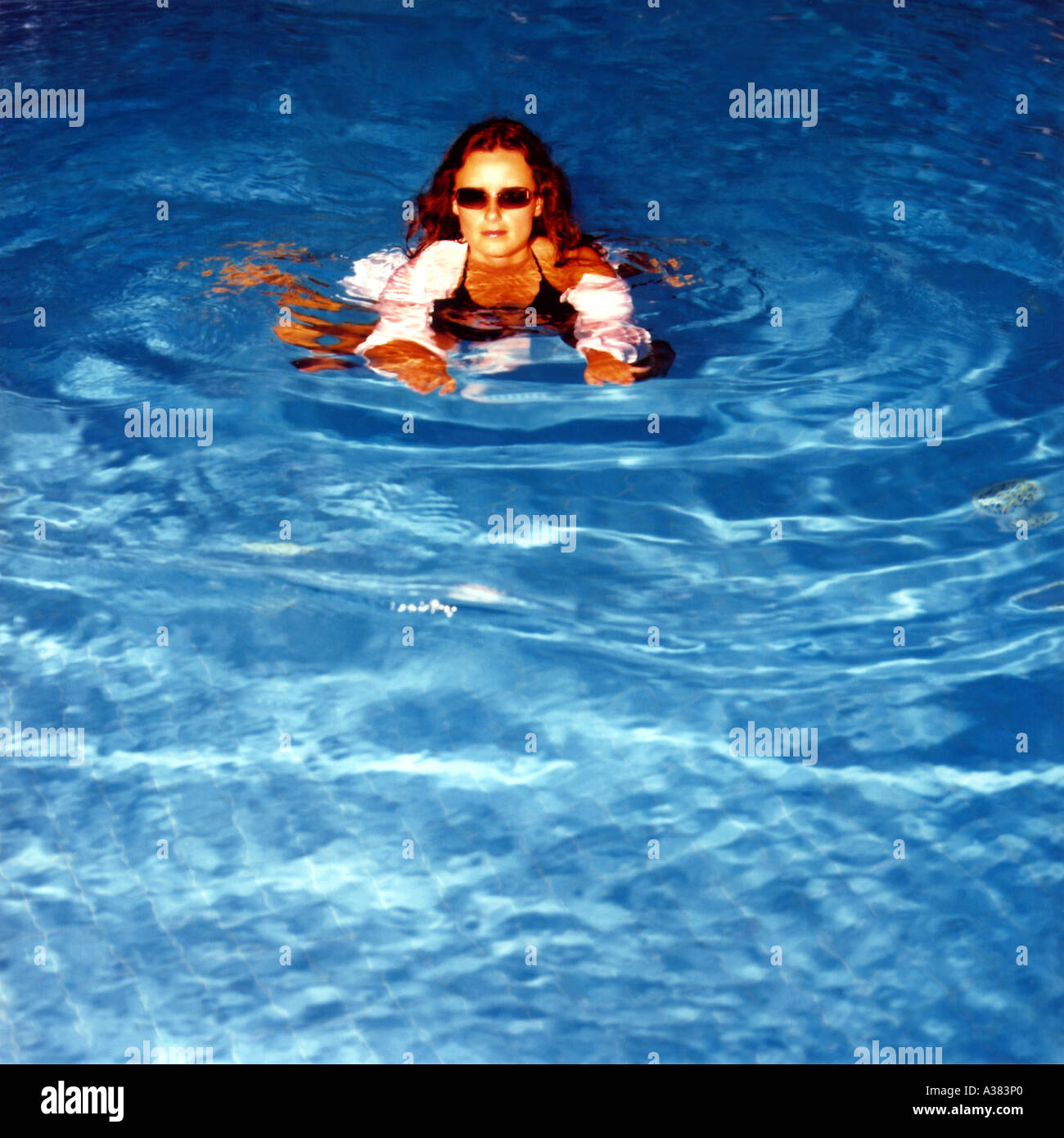Schwimmbad-Frau Stockfoto