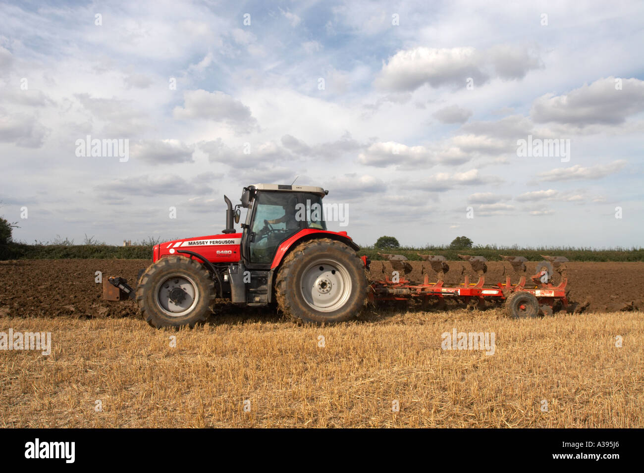 Traktor und Pflug Stockfoto