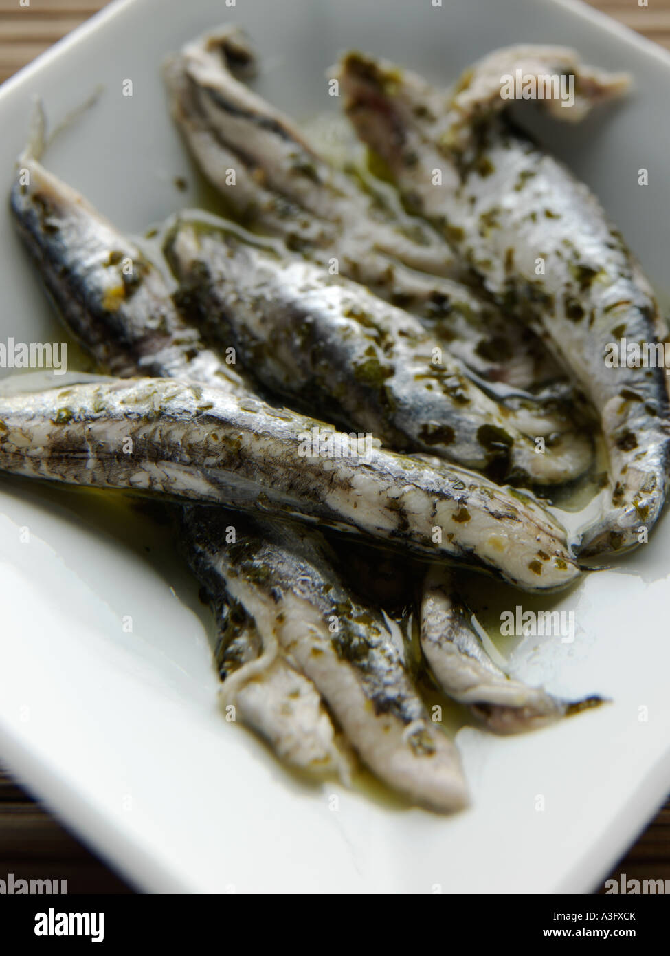 Oily fish anchovy fillets boquerones Fotos und Bildmaterial in hoher