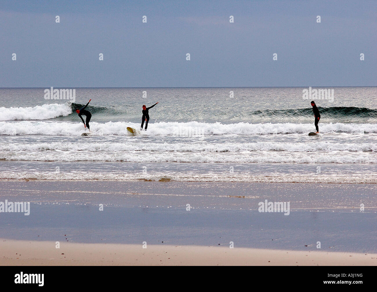 Surfer auf Machirs Bay, Isle of Islay, Schottland Stockfoto