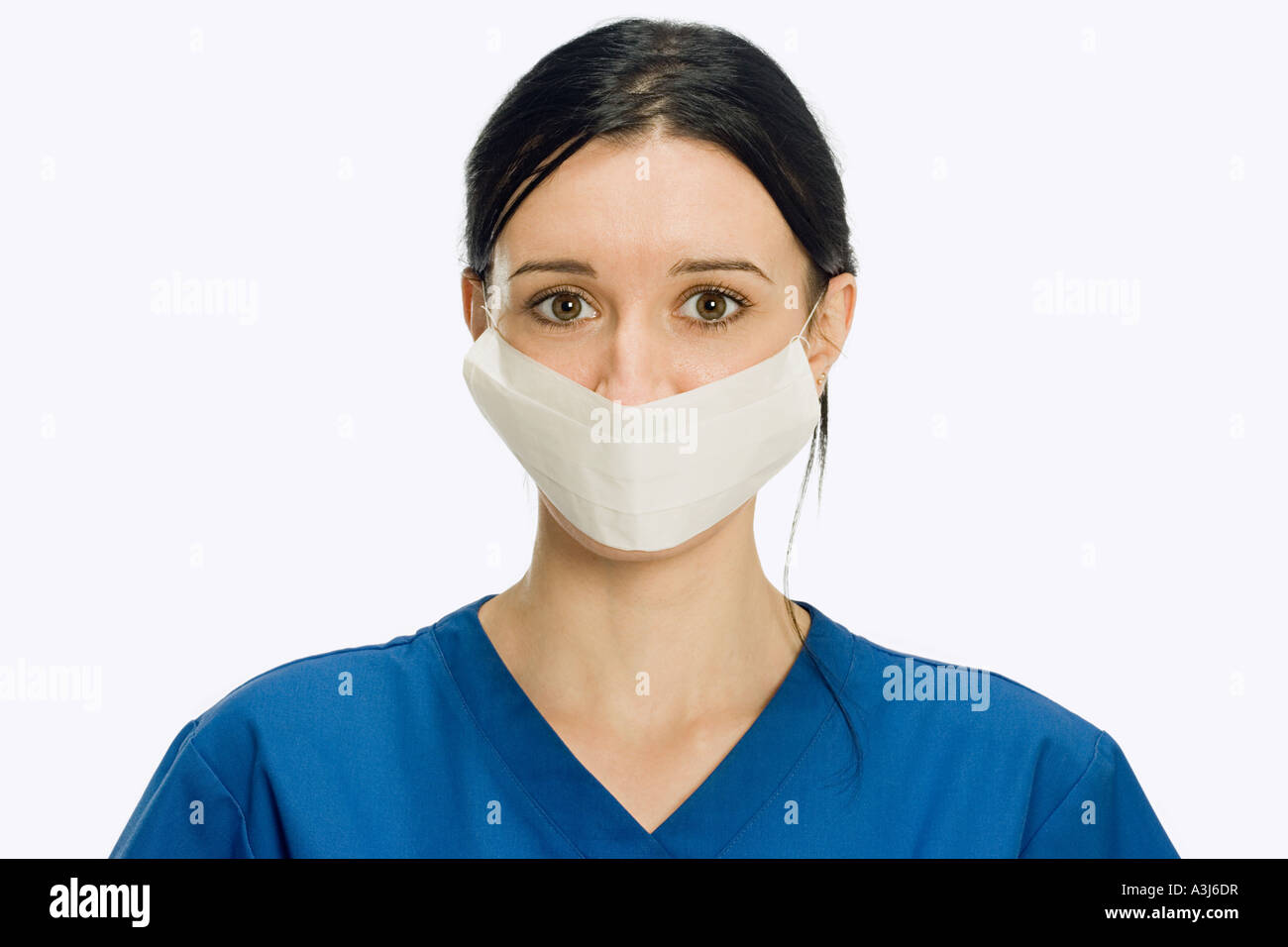 Chirurgen tragen Mundschutz Stockfotografie - Alamy
