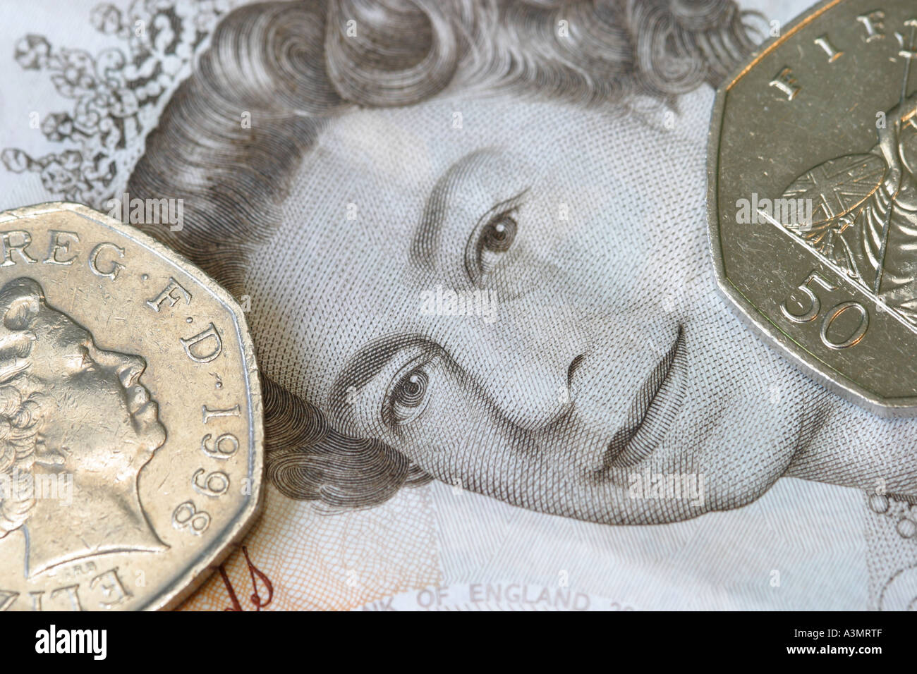 Britische Banknoten und Münzen Stockfoto