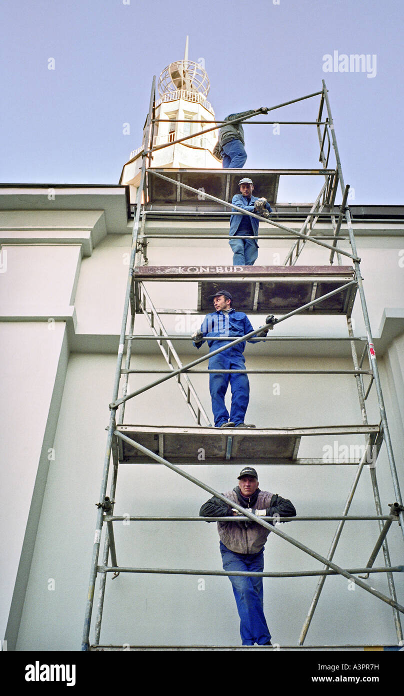 Arbeiter auf einem Gerüst, Poznan, Polen Stockfoto