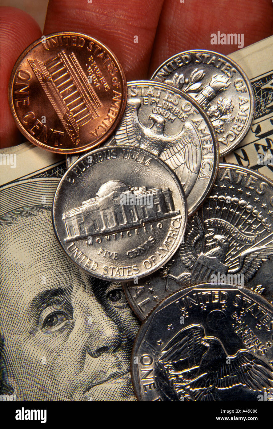 Hand, die US-Währung Stockfoto