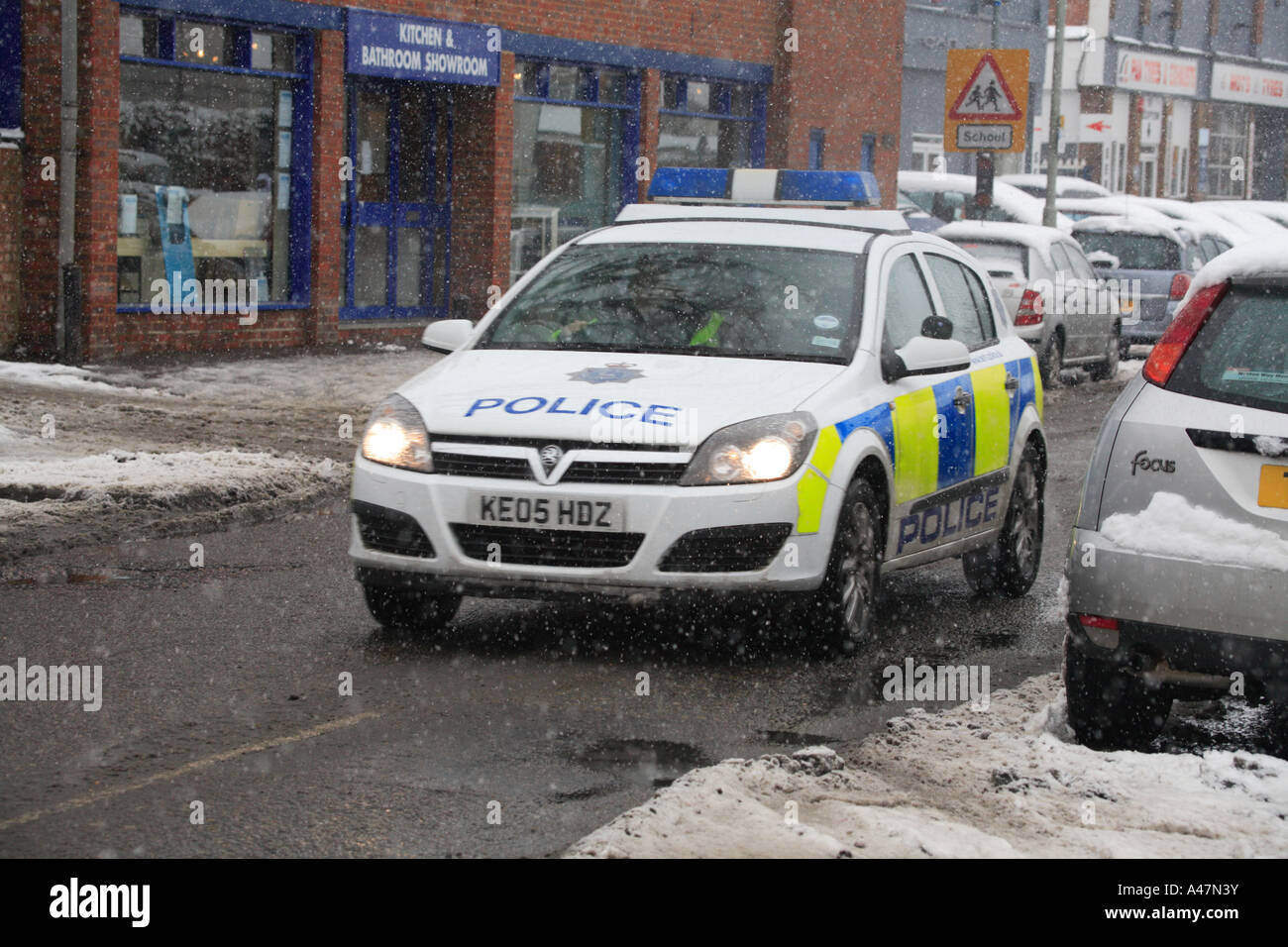 Auto Schnee Polizeistreife Stockfoto