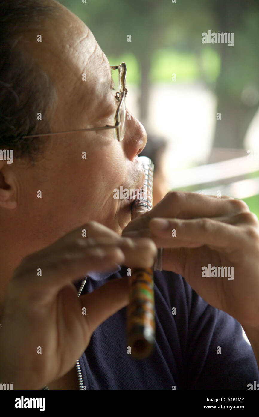 Chinesischen Flötenspieler Stockfoto