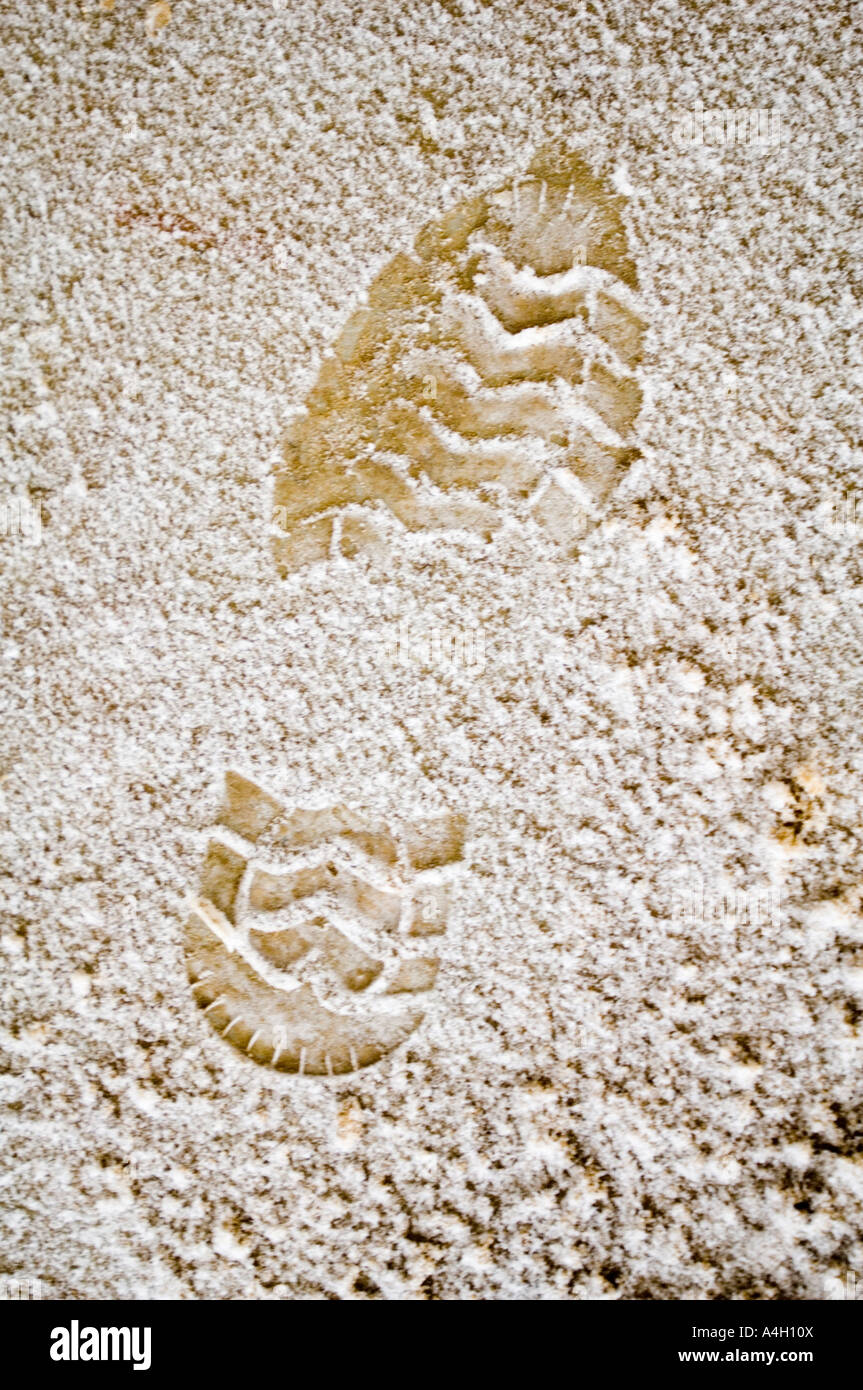 Fußdruck im Schnee Stockfoto