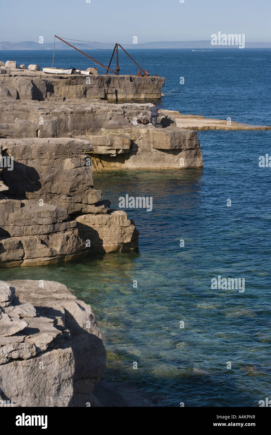 Kran, die einst für das Heben von Stein blockiert jetzt Boote und rockt an Portland Bill Dorset, England Stockfoto