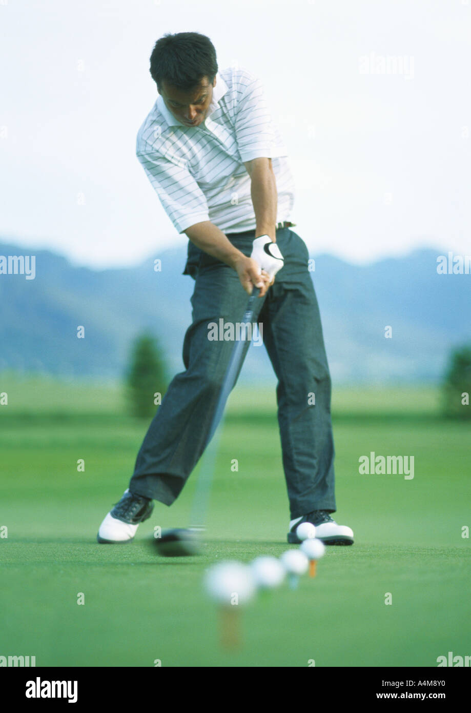 Golfer üben auf der driving-range Stockfoto