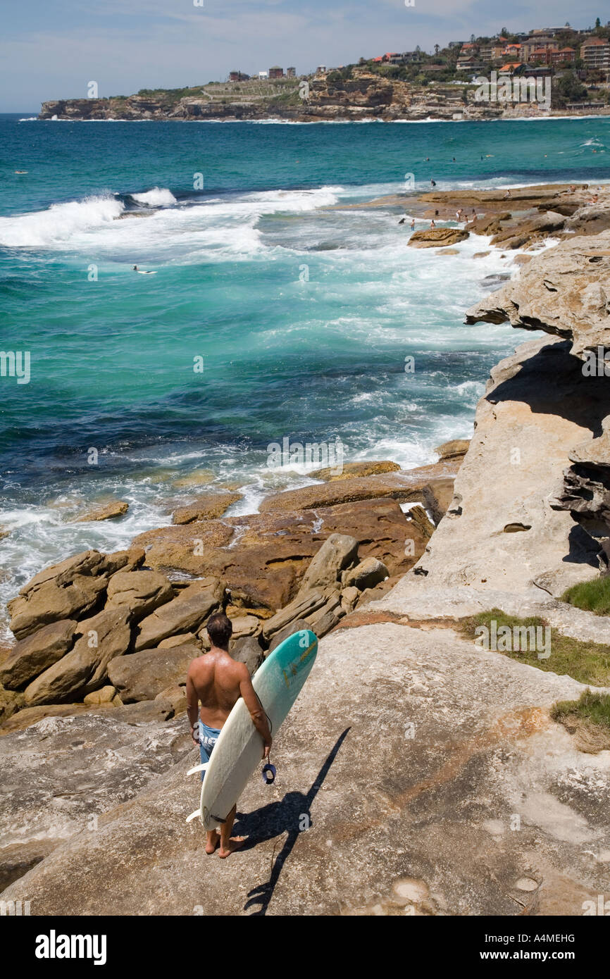 Surfer auf der Bondi, Coogee coastal walk - Sydney, New South Wales, Australien Stockfoto