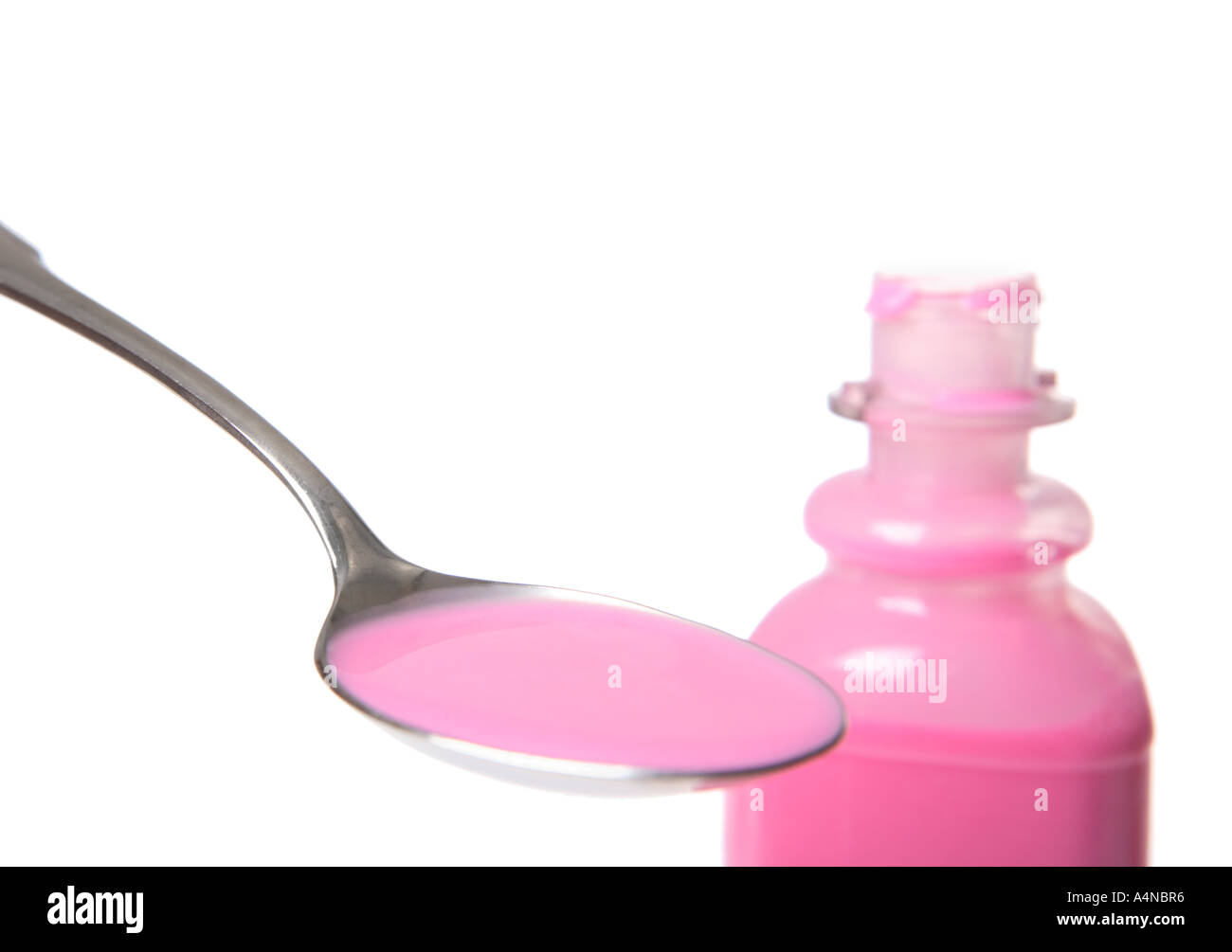 Löffel rosa Medizin Stockfoto
