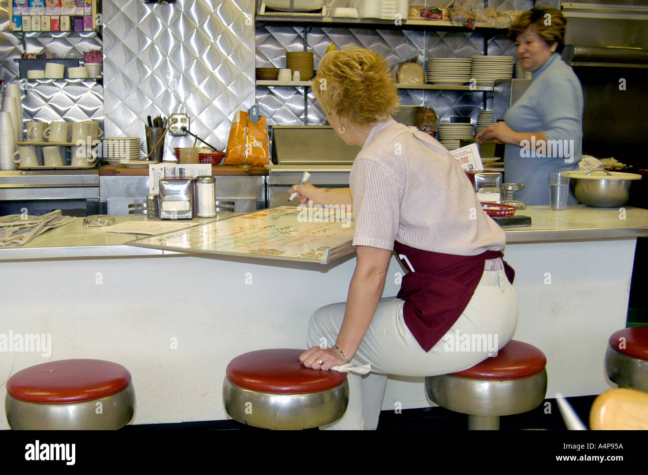Aktivitäten in ein kleines Familienrestaurant Stockfoto