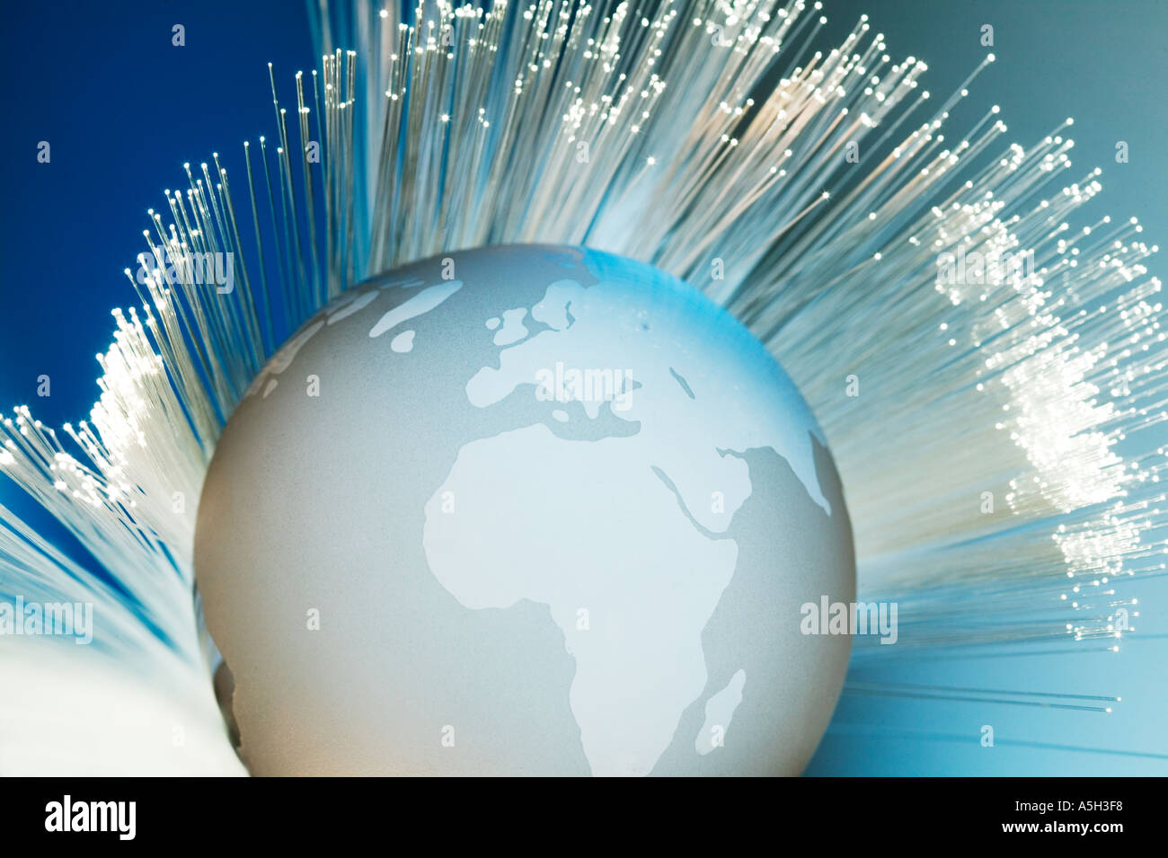 Fiber Optics mit Globus Stockfoto