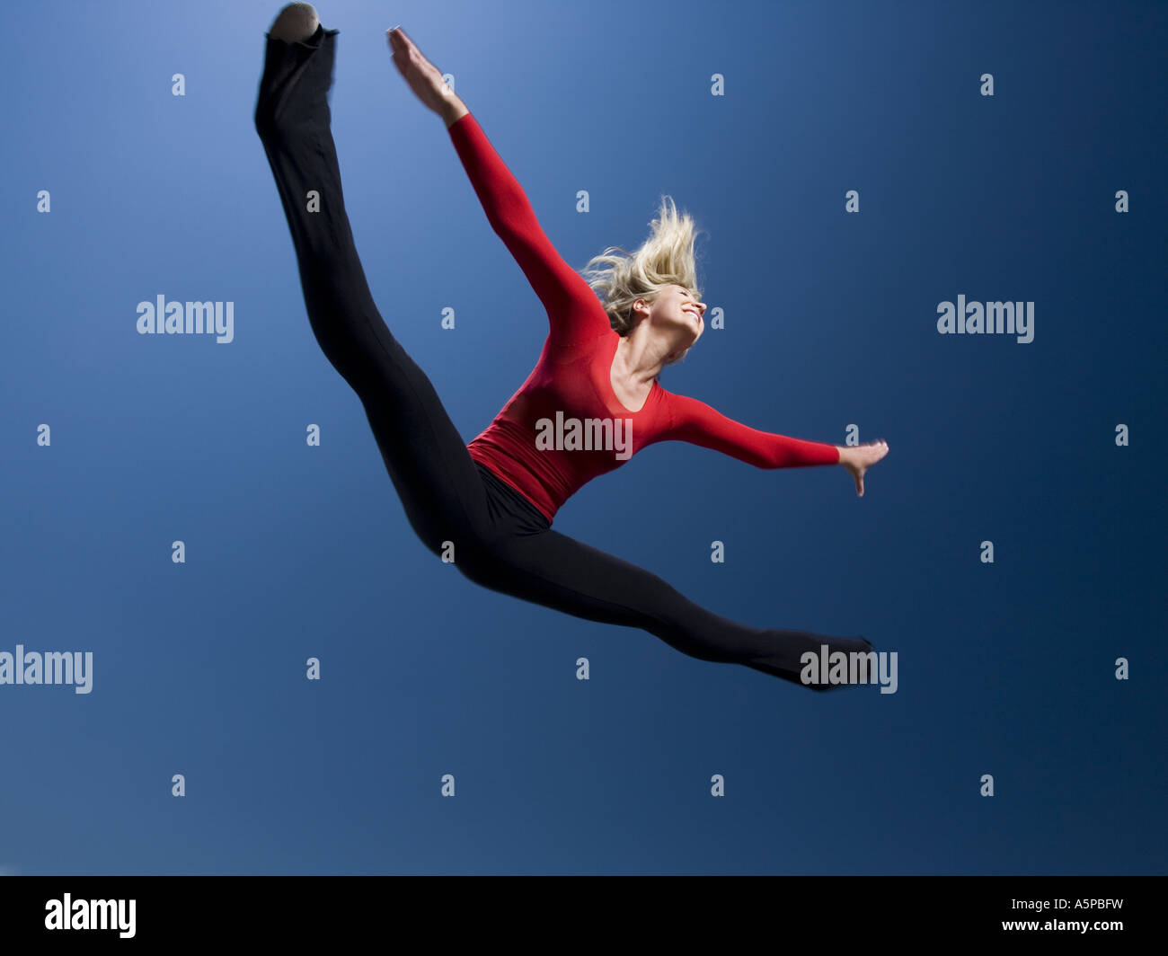 Frau springen Stockfoto