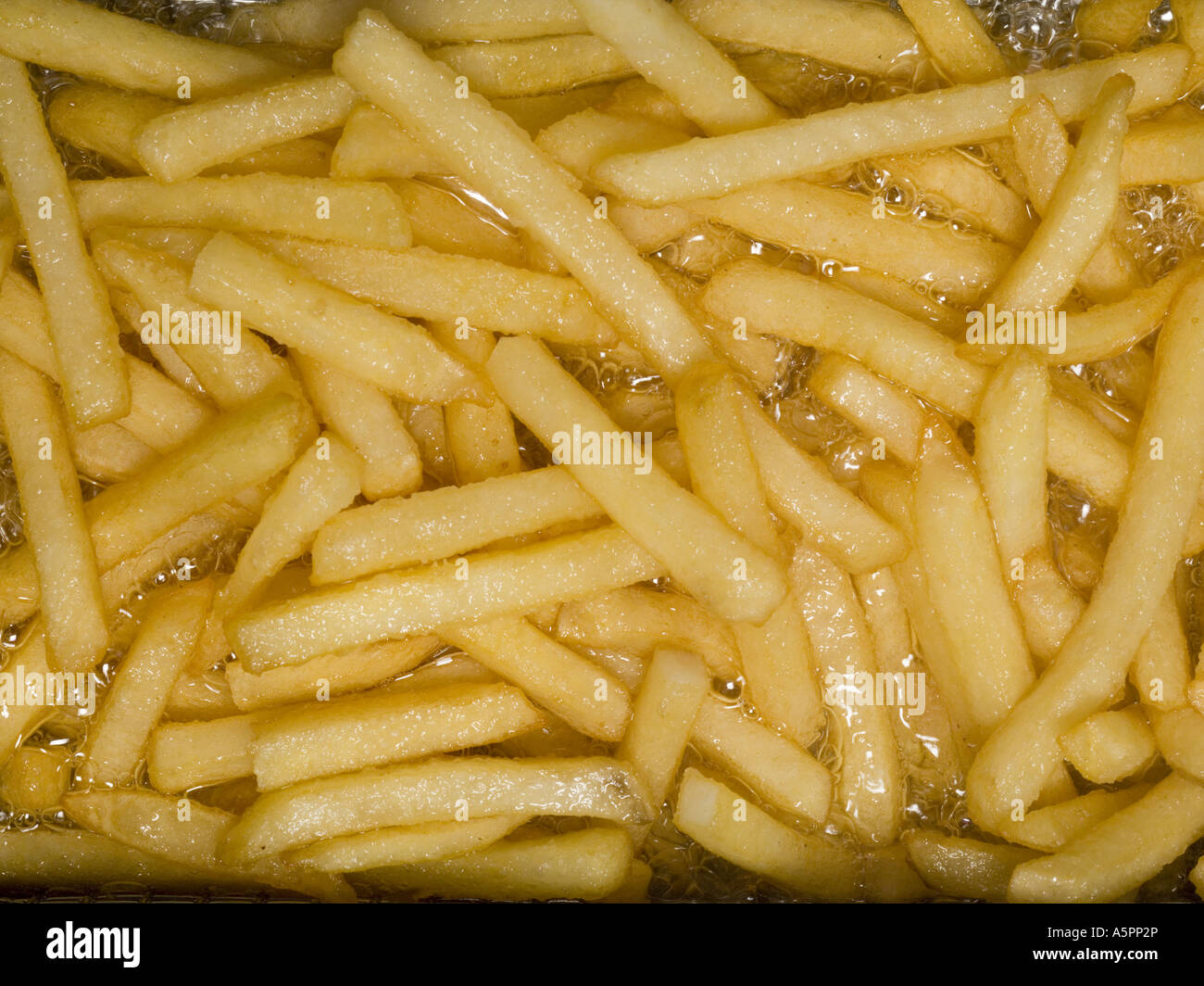 Nahaufnahme von Pommes frites Kochen Stockfoto