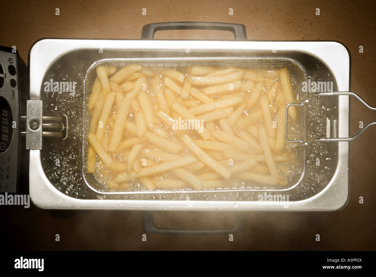 Nahaufnahme von Pommes frites Kochen Stockfoto
