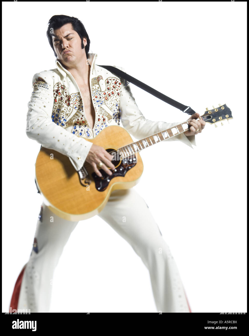 Ein Elvis-Imitator, Gitarre zu spielen Stockfoto Ein Elvis-Imitator, Gitarre zu spielen Stockfoto