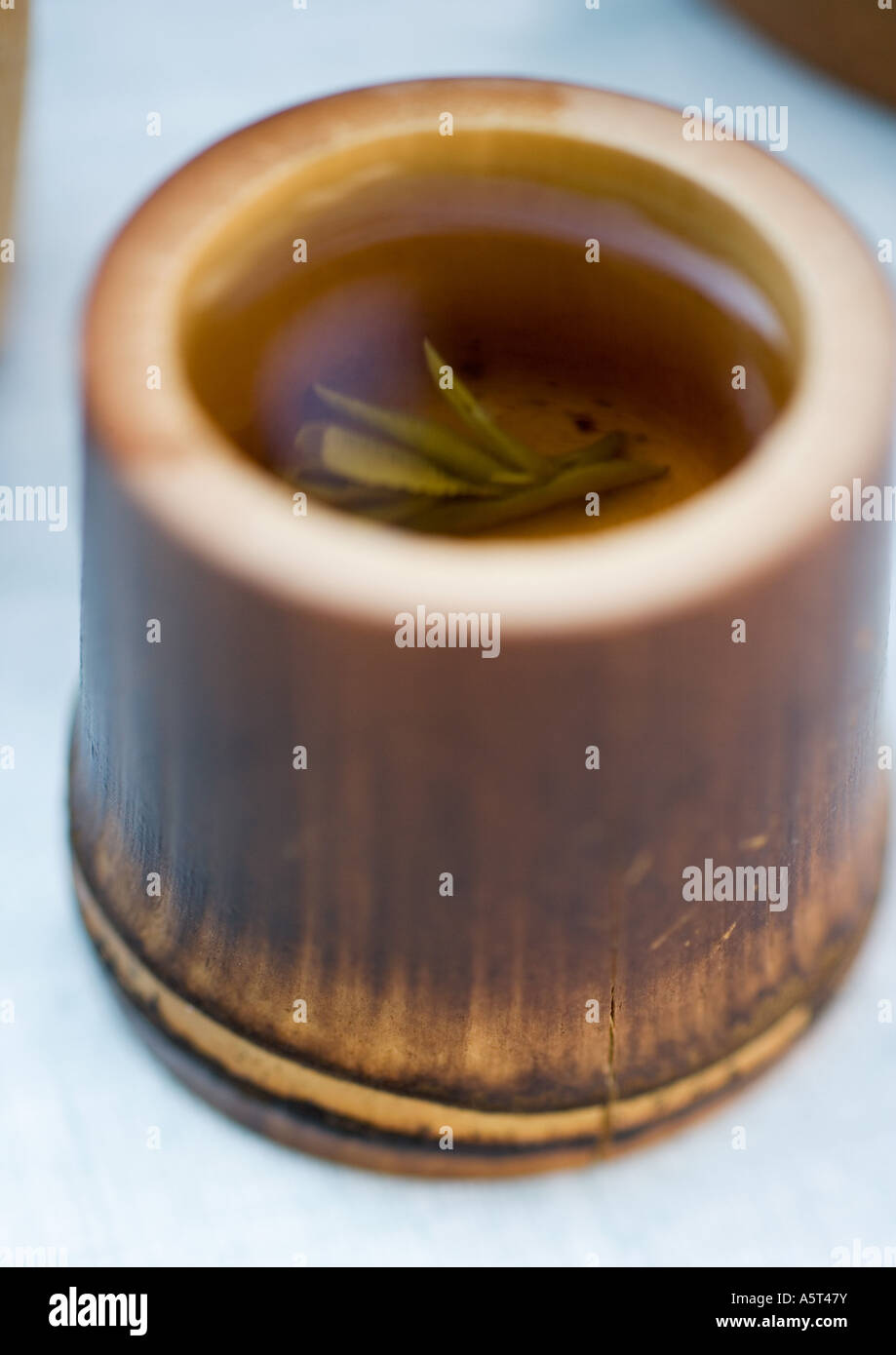 Bambus Tasse Tee Stockfoto