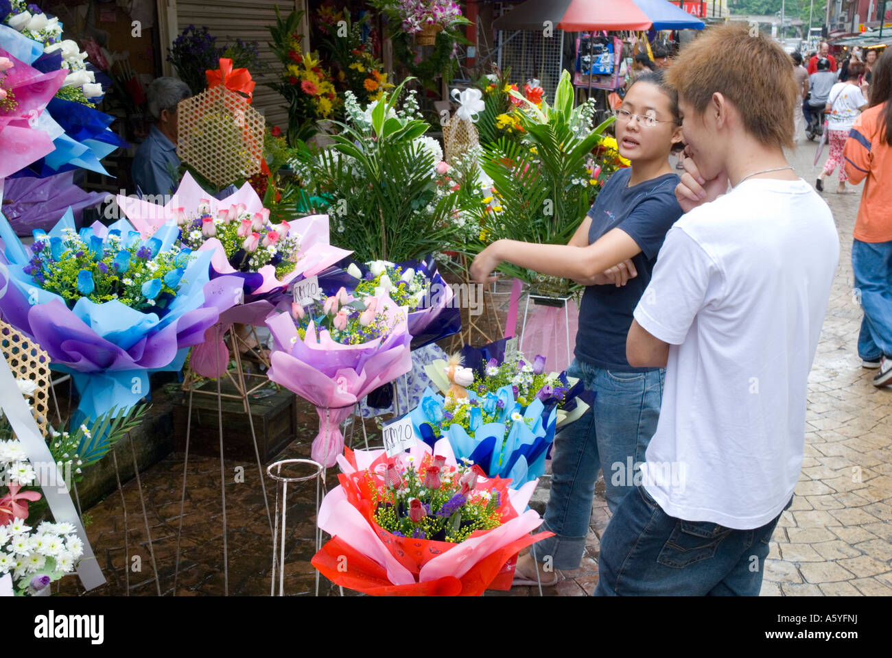 Straßenmarkt Stall zu verkaufen Blumen in der Nähe von Jalan Petaling im Zentrum von Kuala Lumpur Stockfoto