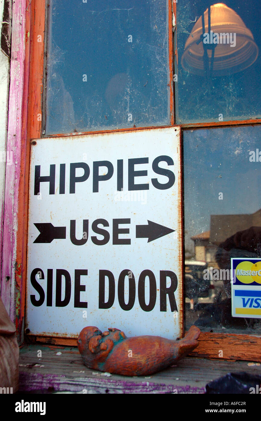 Hippies Use Side Door Store Fenster Zeichen in Berkeley California ordentlich Völker Park Nachbarschaft University Stockfoto