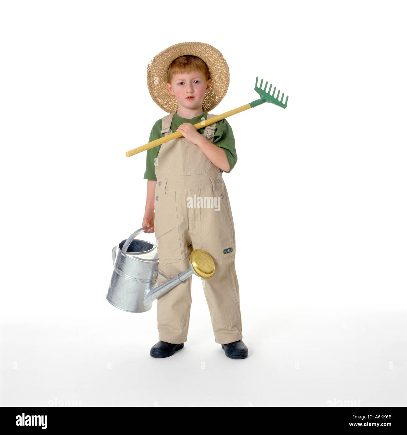 Kleiner Junge als Gärtner verkleidet Stockfoto
