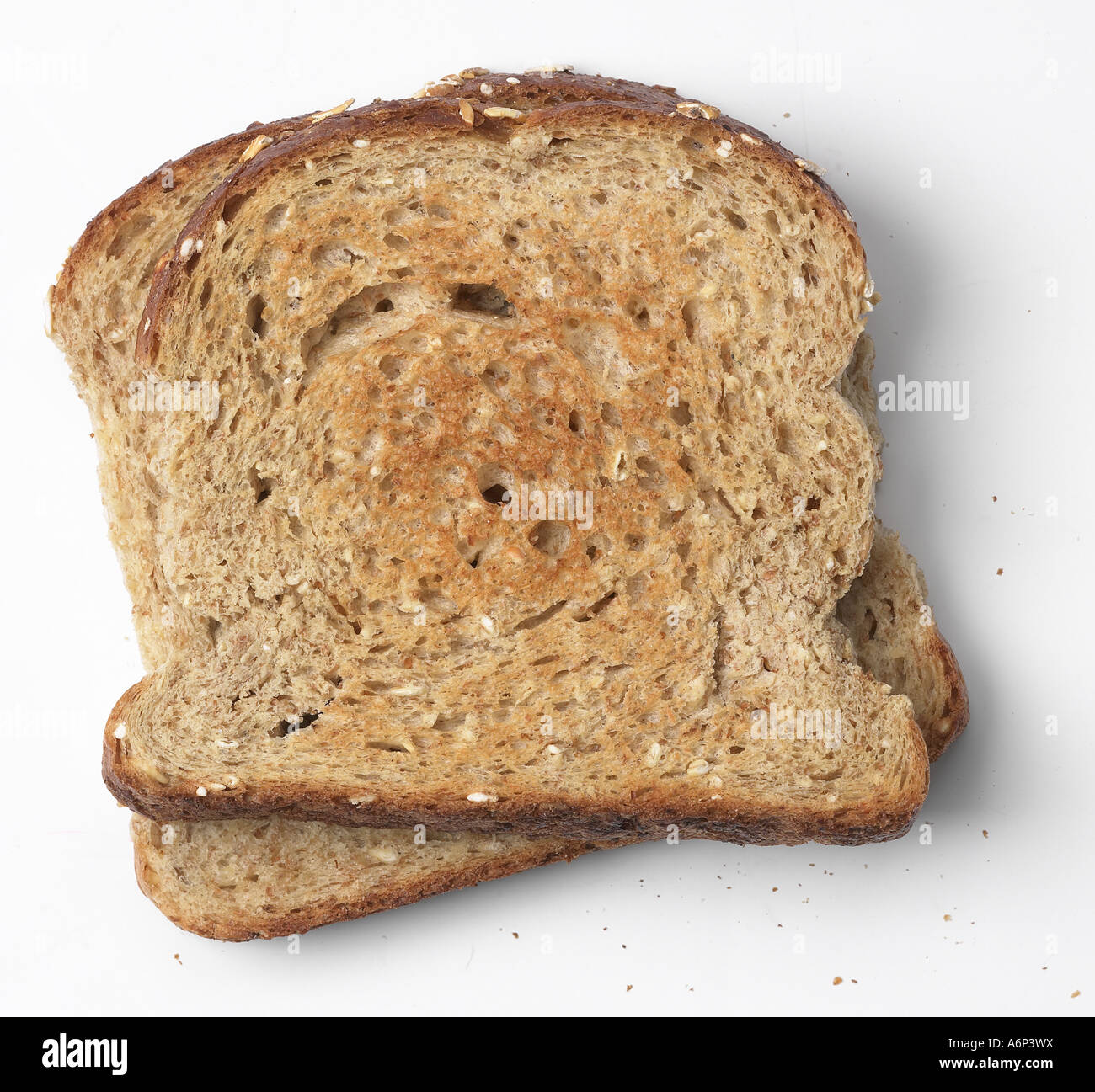 zwei Scheiben Toast auf weiß mit einem Schatten Stockfoto