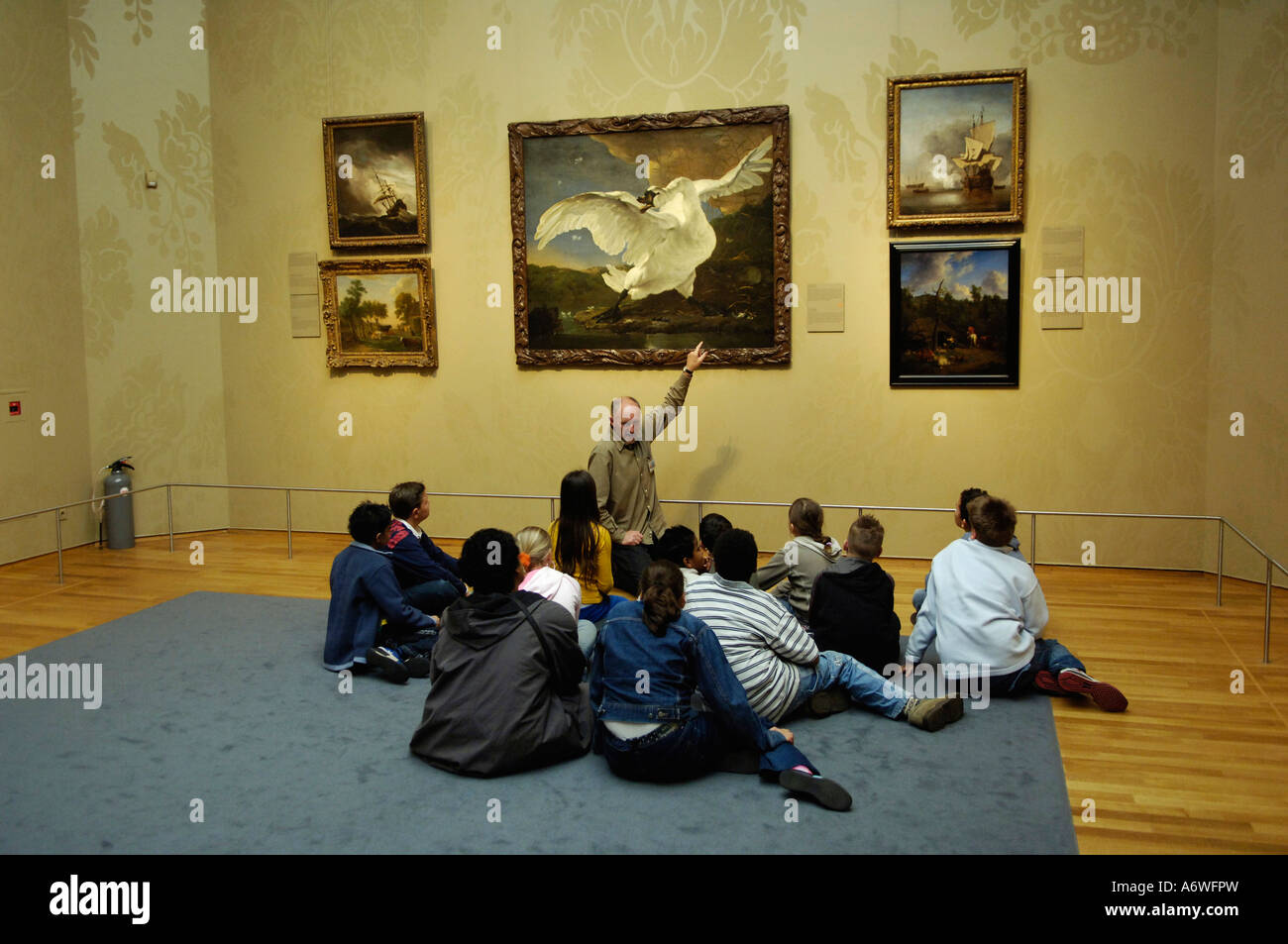 Amsterdams Rijksmuseum Lehrer zeigt eine Klasse Schüler Ölgemälde von Dutch Master Jan Steen aus dem 17. Jahrhundert Stockfoto